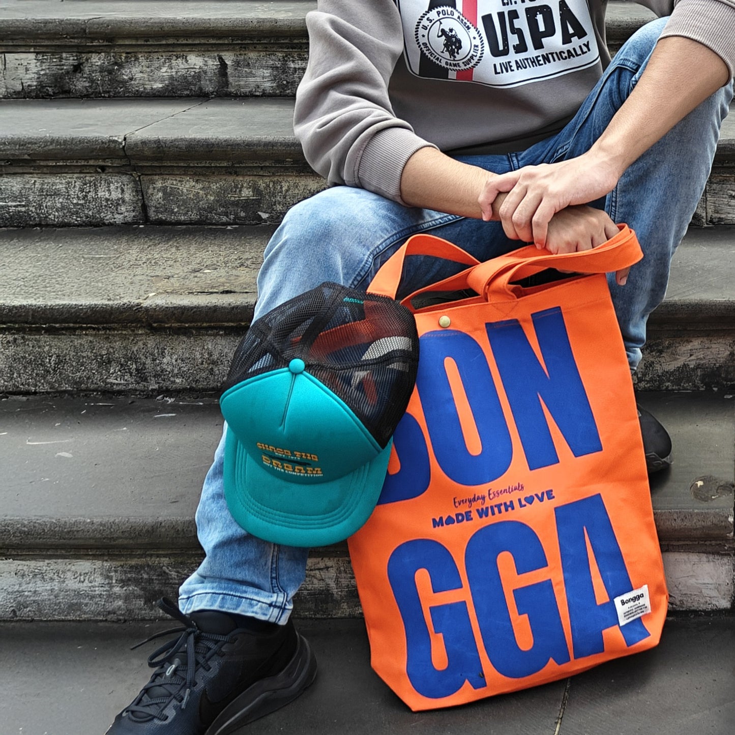 Bold typography canvas tote bag in pumpkin color from Bongga Everyday Essentials.